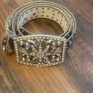 Elegant Silver Belt with Floral Buckle